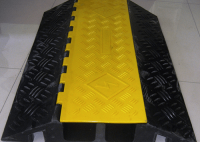 Yellow elevated jacket cable protectors – used for pedestrian traffic 3’ long